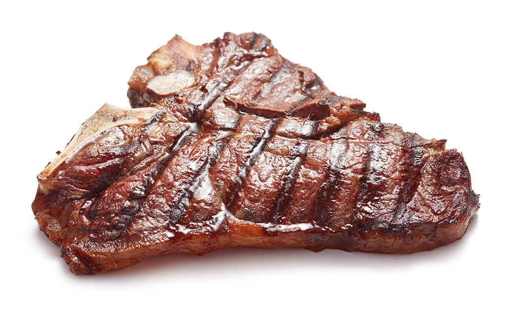 Grilled beef steak isolated on white background