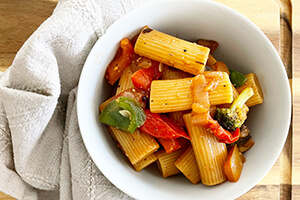 pasta with cooked vegetables in a bowl